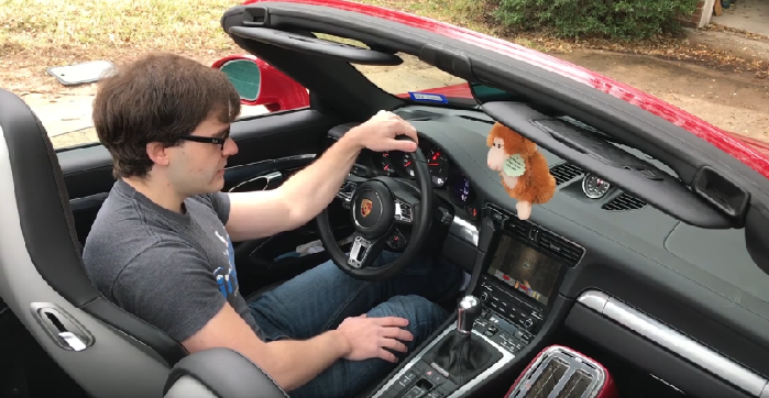 Man mods his Porsche 911 to play Doom utilizing the steering wheel, shifter, and horn – or does he? Man mods his Porsche 911 to play Doom utilizing the steering wheel, shifter, and horn – or does he?