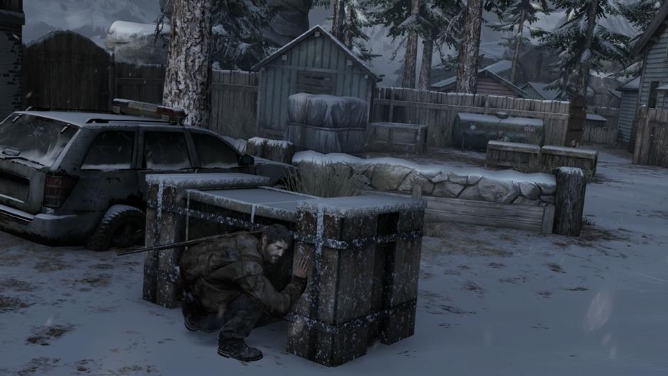 joel crouches behind crate_1406290304 (Copy)